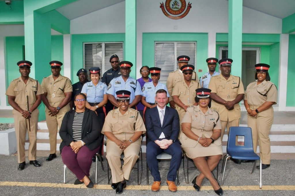 The Royal Bahamas Police Force instructor cohort assembled outside the Training College in Nassau.