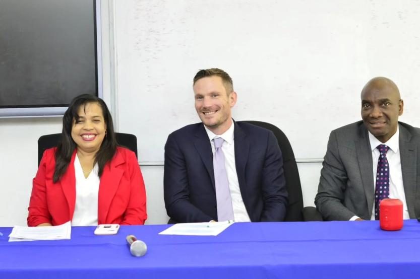 Benjamin Steiner seated between Dr. Paulette Feraria and a senior JCF officer at the opening of the course.